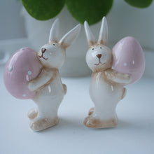 Load image into Gallery viewer, Pair of Ceramic Rabbits Carrying Pink Eggs | Cute Bunnys | Easter Decor |Spring Decor

