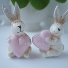 Load image into Gallery viewer, Pair of Ceramic Rabbits Carrying Pink Hearts | Cute Bunnys | Easter Decor |Spring Decor
